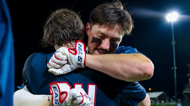 Ole Miss' Judd Utermark and Austin Fawley celebrate the Rebels' NCAA Regional championship after a 10-inning win against Arizona State. | Ole Miss Athletics