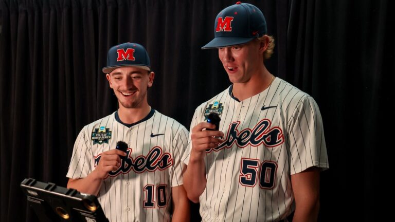 Ole Miss pitchers Cade Townsend, left and Taylor Rabe participate in a media activity Thursday at the College World Series Media Day. | Ole Miss Athletics