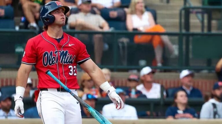 Ole Miss outfielder Tristan Bissetta watches his eighth inning home run against Auburn after tossing his bat in a Super Regional game. | Ole Miss Athletics