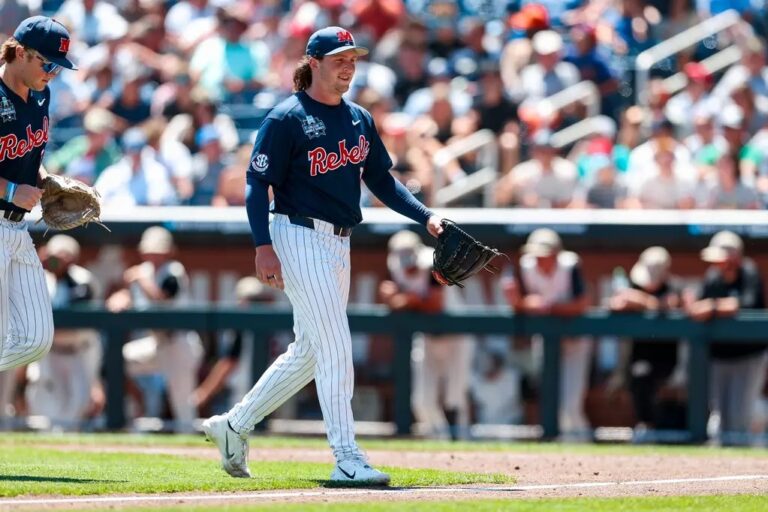 Ole Miss pitcher Hunter Elliott walks back to the dugout in a College World Series game against Troy. | Ole Miss Athletics