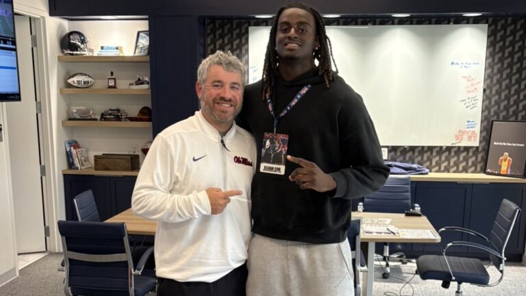 Ole Miss head coach Pete Golding with edge Elijah Cox. | Elijah Cox/X