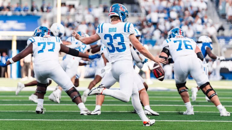 Ole Miss punter Oscar Bird punts during a game against Kentucky in Lexington. | Ole Miss Athletics