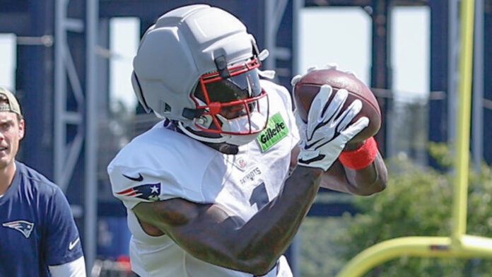 New England Patriots wide receiver A.J. Brown (1) makes a catch during training camp