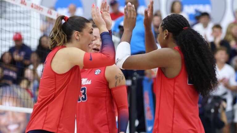 Ole Miss volleyball players celebrate a point won Friday in their season-opening win against Southeastern Louisiana. | Ole Miss Athletics