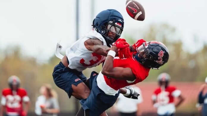 Ole Miss defensive back breaks up a pass during a spring practice. | Ole Miss Athletics