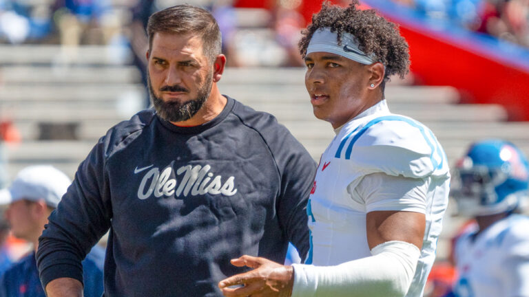 Ole Miss Rebels offensive coordinator John David Baker and quarterback Trinidad Chambliss in game against the Florida Gators at Ben Hill Griffin Stadium