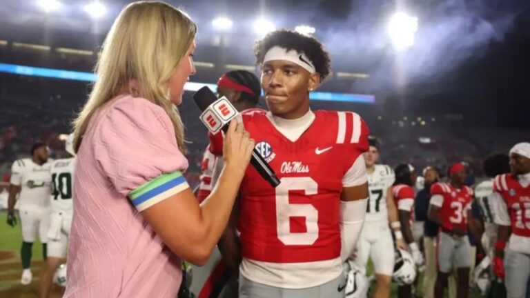 Ole Miss quarterback Trinidad Chambliss gives on field interview after a 41-9 win over Charlotte. | Ole Miss Athletics