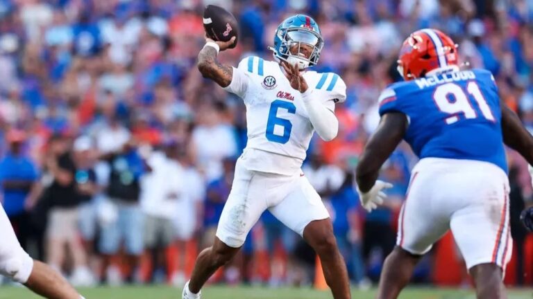 Ole Miss quarterback Trinidad Chambliss throws a pass against Florida. | Ole Miss Athletics
