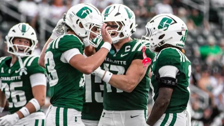 Charlotte quarterback Cole Gonzales celebrates a touchdown with teammates against The Citadel. | Charlotte Athletics