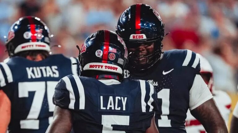 Ole Miss lineman Delano Townsend and running back Kewan Lacy celebrate the first touchdown of the season for the Rebels against Louisville. | Ole Miss Athletics