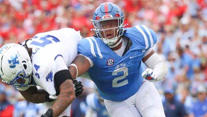 Ole Miss defensive tackle Walter Nolen tackles a Kentucky player during a 2024 game. | Ole Miss Athletics