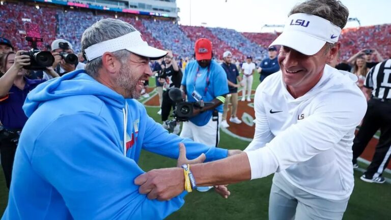 LSU coach Lane Kiffin and Ole Miss coach Pete Golding meet before Kiffin’s first game back at Vaught-Hemingway Stadium. | Ole Miss Athletics