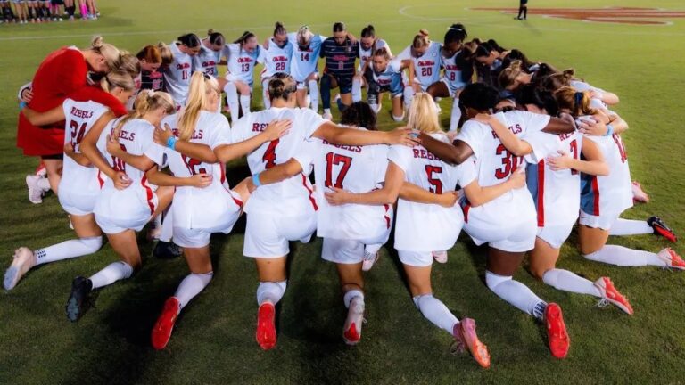 Ole Miss women's soccer team huddles before a game against Mississippi State. | Ole Miss Athletics