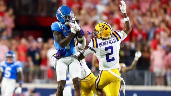 Ole Miss wide receiver Traylon Ray makes a catch against two LSU defenders in the Rebels' 32-24 win. | Ole Miss Athletics