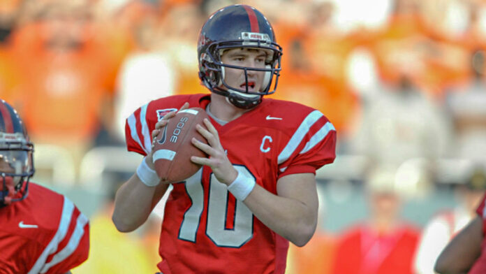 Former Ole Miss Rebels quarterback Eli Manning looks for a receiver during a 31-28 win over the Oklahoma State Cowboys in the 2004 SBC Cotton Bowl