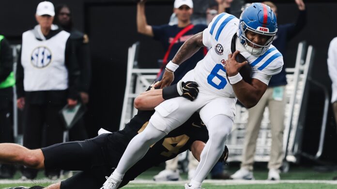 Ole Miss quarterback Trinidad Chambliss spins his way into the end zone against Vanderbilt. | Ole Miss Athletics