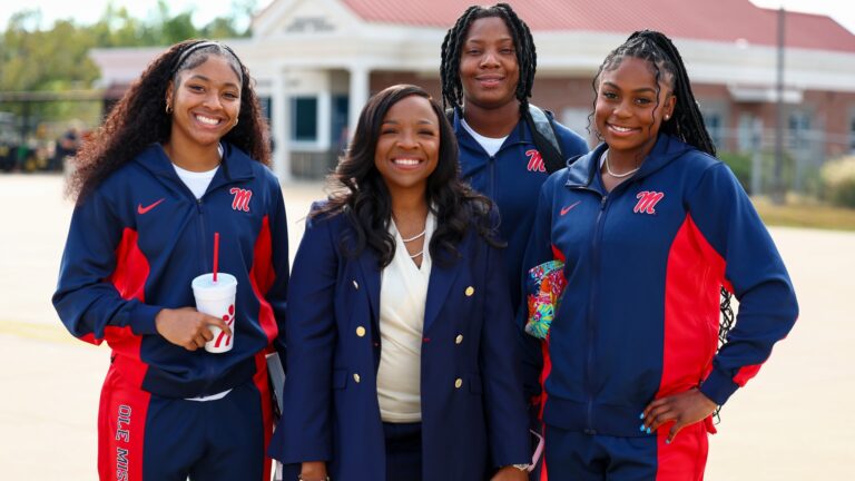 Ole Miss women's basketball head coach Yolett McPhee-McCuin with Talaysia Cooper, Lauren Jacobs and Jada Richard. | Ole Miss Athletics