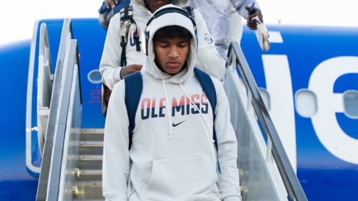 Ole Miss quarterback Trinidad Chambliss walks off a plane in Austin, Texas. | Ole Miss Athletics