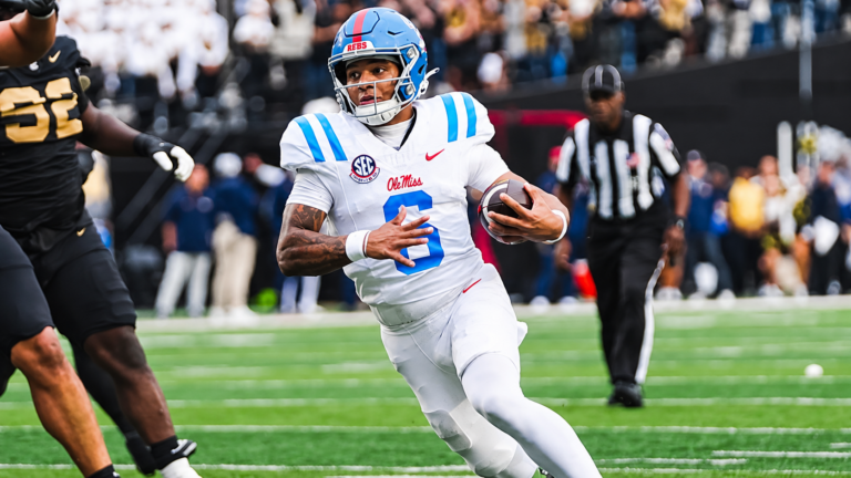 Ole Miss quarterback Trinidad Chambliss looks towards the end zone on a run against Vanderbilt. | Ole Miss Athletics