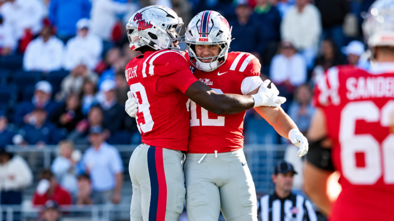 Ole Miss linebackers Tahj Butler and Luke Ferrelli celebrate a defensive stop against Missouri. | Ole Miss Athletics