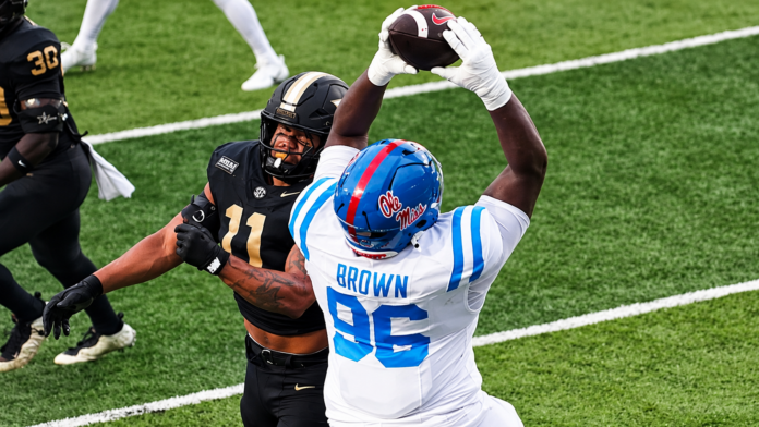 Ole Miss defensive tackle Jamarious Brown makes a touchdown catch against Vanderbilt. | Ole Miss Athletics