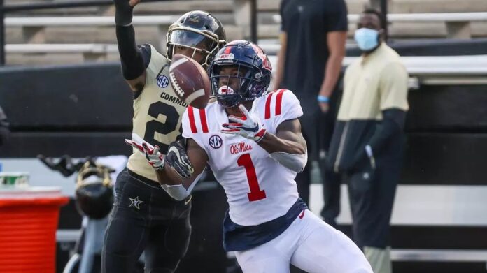 Ole Miss wide receiver Jonathan Mingo catches a pass in front of a Vanderbilt defender on October 31, 2020. It was the last time the Rebels played on Halloween. | Photo by Joshua McCoy/Ole Miss Athletics