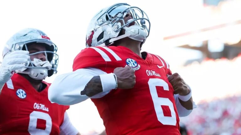 Ole Miss quarterback Trinidad Chambliss celebrates his touchdown run during the Rebels' 31-3 win against Missouri. | Ole Miss Athletics